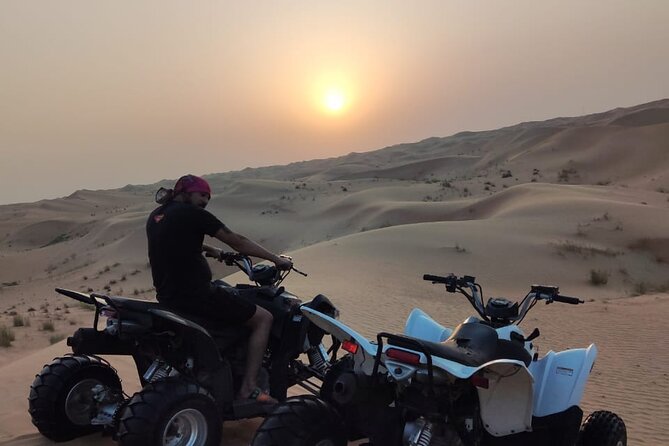 1 hour Quad Biking Experience with pick and drop - Deep desert views, farms, and camels