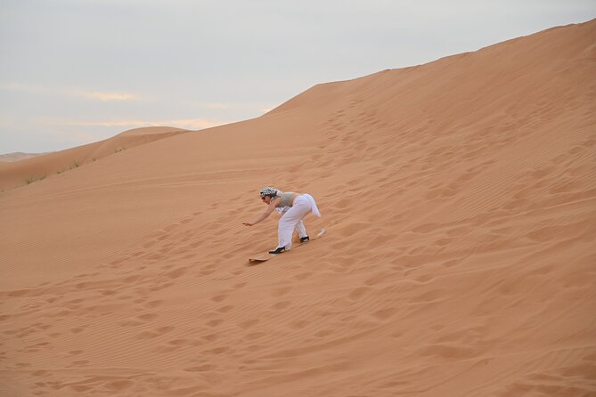 4 Hour Morning Desert Safari with Camel Ride & Sand Boarding - Dune bashing on the high red dunes