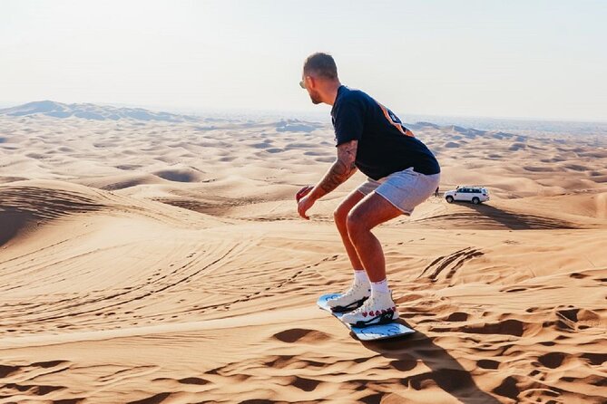 4 Hour Morning Desert Safari with Camel Ride & Sand Boarding - Sandboarding and desert photographs