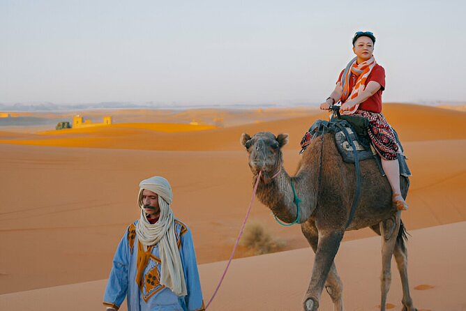 4 Hour Morning Desert Safari with Camel Ride & Sand Boarding - Camel riding, with one important package detail