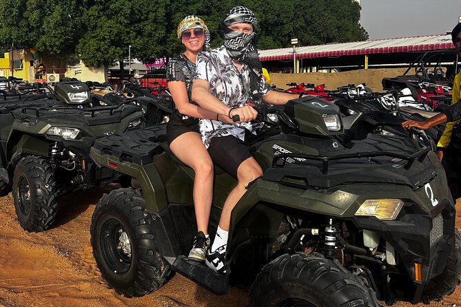 4 Hours Desert Tour with Quad Bike Camel Ride & Sandboard - Guides, photographs, and the human side of the trip
