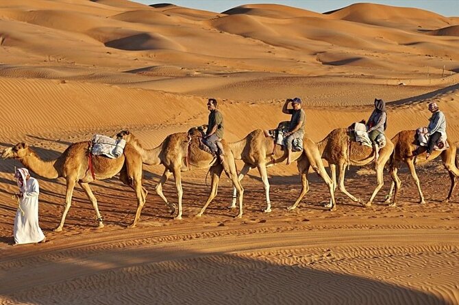 4x4 Arabian Adventure Desert Safari with BBQ Dinner - Belly dancing, Tanura, and fire shows
