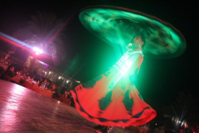 4x4 Desert Safari Abu Dhabi with BBQ Dinner - Sandboarding across the dunes