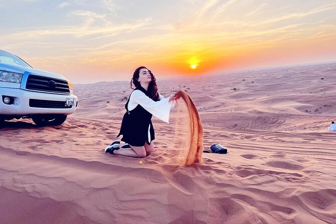 4X4 Dubai Desert Safari with BBQ dinner, Camels & Live Show - Dune bashing and the Lahbab photo stop