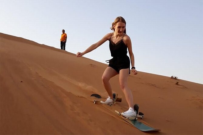 6-Hour Dubai Desert Dinner Safari with Dune Bashing & Camel Ride - BBQ dinner with Tanoura and belly dancing