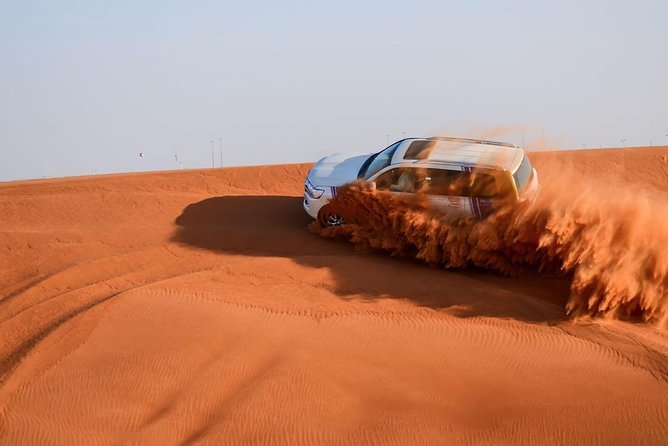 6-Hour Dubai Desert Safari with BBQ Dinner & Quad Biking - Leaving Dubai for a six-hour desert evening