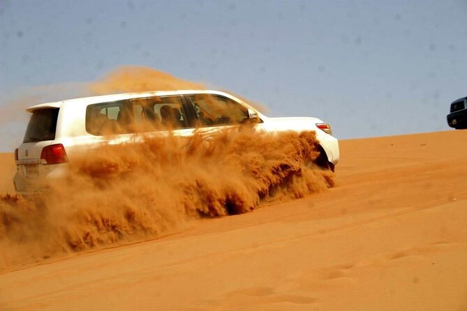 6 Hour Thrilling Desert Safari in 4x4 with Entertainment Show - Sandboarding near the camp