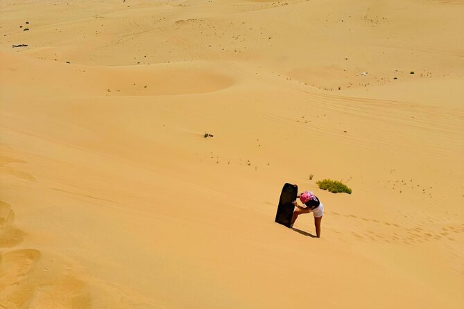 Abu Dhabi: 4x4 Desert Safari and Sandboarding. - Sandboarding at the traditional camp
