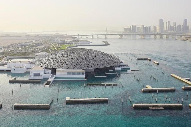 Abu Dhabi City Tour from Dubai - Full Day (optional) - Corniche Beach is seen from the vehicle