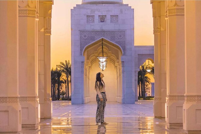 Abu Dhabi City Tour: Grand Mosque, Palace, Souk, Louvre & Ferrari - Etihad Towers and the Corniche photo rhythm