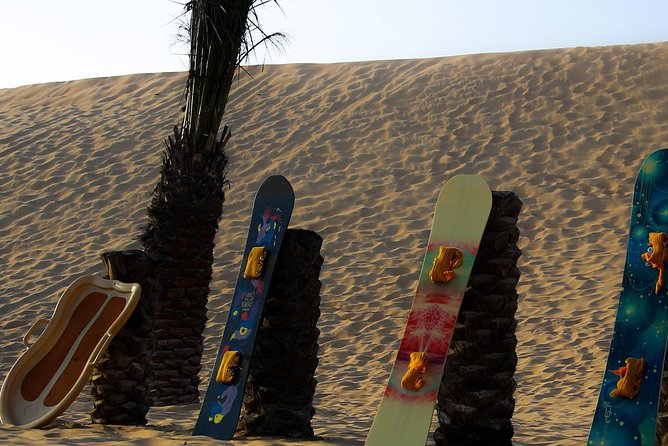 Abu Dhabi Desert Safari (Dune Bashing, BBQ Dinner, Camel Ride & Sand Skii) - BBQ dinner under the night sky