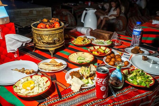 Abu Dhabi Desert Safari: Live Shows, Camel Rides & BBQ Buffet - Camel riding and the Bedouin-style camp