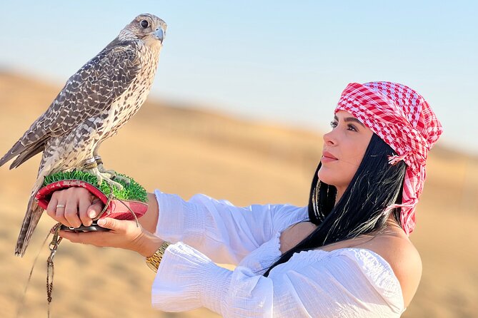 Abu Dhabi Desert Safari Tour with Shows & Buffet Dinner - Dune bashing at Al Ajban