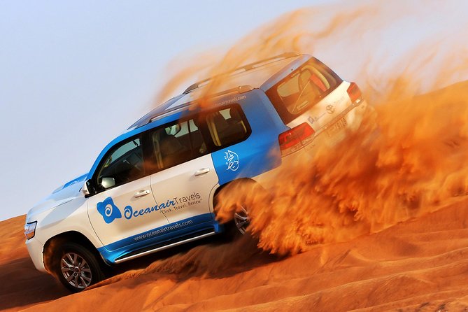 Abu Dhabi: Desert Safari with BBQ, Camel Ride & Sandboarding - The camel farm adds a quieter opening