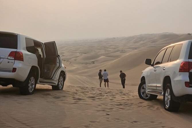Abu Dhabi Desert Safari With Live Shows And BBQ Buffet Dinner - Camel riding and sand boarding