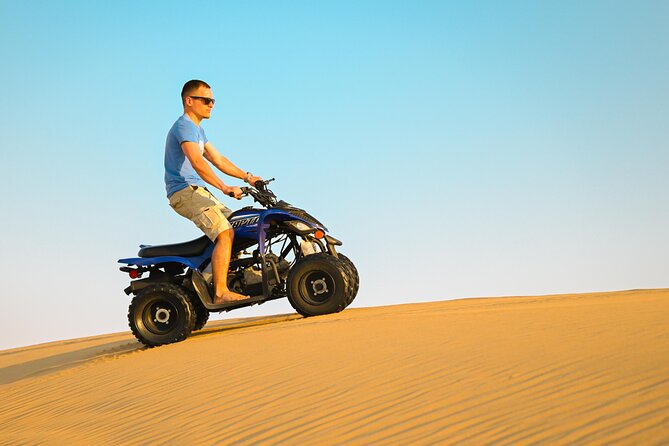 Abu Dhabi Evening Desert Safari - Private car Dune bashing & BBQ - Preparing the Land Cruiser for soft sand