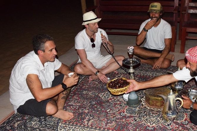 Abu Dhabi Evening Desert Safari with BBQ Dinner and all Camp Activities - Dinner at the Torchlit Desert Camp