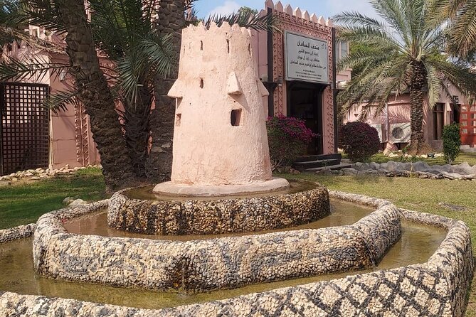 Abu Dhabi tour from Dubai small group with guide, Grand Mosque - Heritage Village: useful context, but not the strongest stop