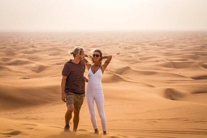 Adventurous Red Dune Desert Safari Deal with Quad Bike,Shows &BBQ - Sunset is the quiet reward