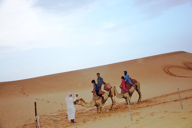 Al Ain Desert Safari with Buffet Dinner - Buffet dinner and live entertainment after sunset