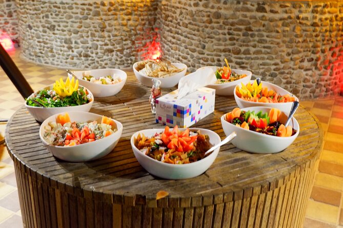 Al Madam Red Sand Safari with BBQ Dinner & Traditional Show - Sandboarding adds a simple burst of fun