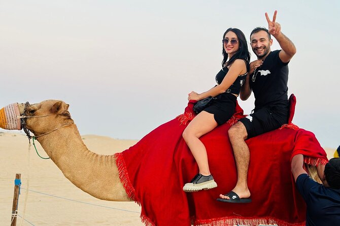Arabian Desert Safari Abu Dhabi: 6Hour Tour with BBQ & Live Shows - Sandboarding, camels, and the photo opportunities