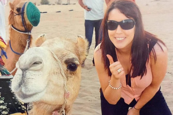 Arabian Desert Safari with BBQ Dinner Camel Ride, Sand Boarding - Jannat Desert Safari Camp after dark