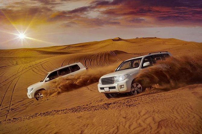 Arabian Desert Safari with BBQ Dinner Camel Ride, Sand Boarding - Sunset at Big Red Dunes