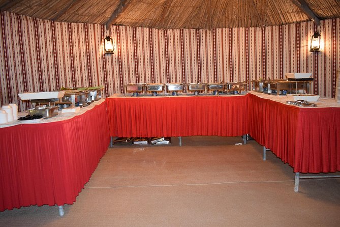 Classic Dubai Desert Safari with BBQ Dinner and Camp activities - Tanoura, fire, and belly dance