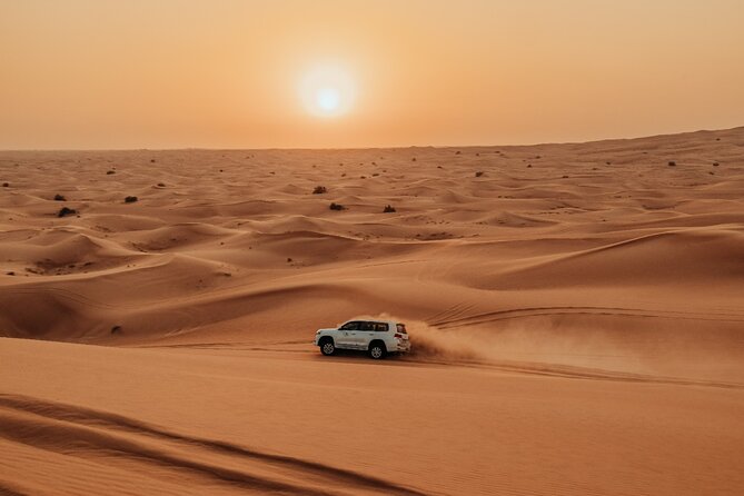 Combo:Deluxe Desert Safari with dinner + ATV self-drive/Quad Bike - Henna, shisha, and the camp atmosphere