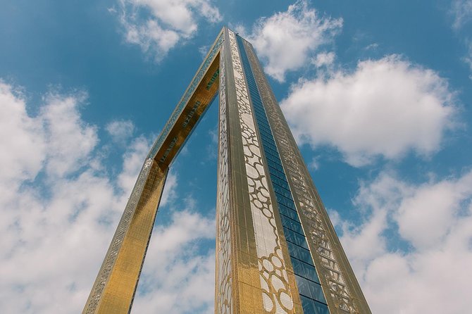 Combo Dubai Frame and Desert Safari with Dinner - Dune bashing, photo stops, and sand boarding