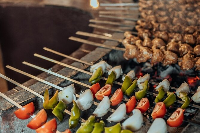 Deluxe Sunset Desert Safari: SandSurfing, Camel Ride & BBQ dinner - What $68.60 buys you