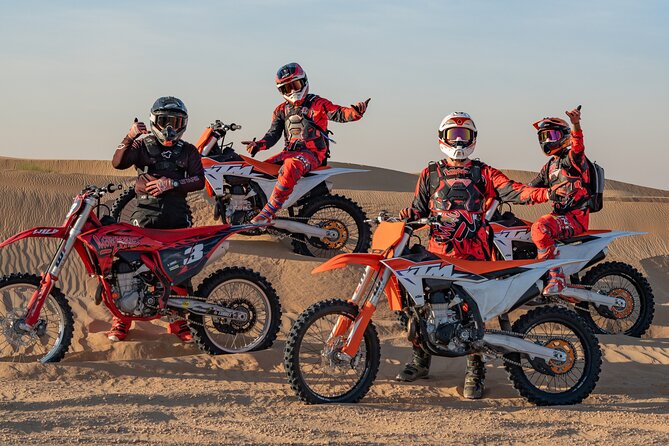 Desert Motorbike Tour in Dubai - Riding through steep dunes and open desert
