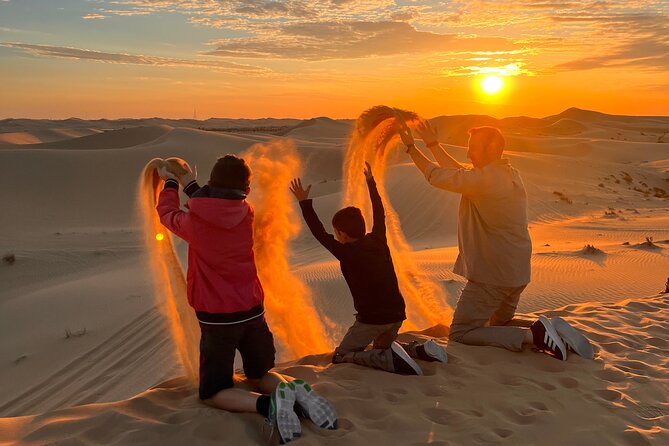 Desert Safari Abu Dhabi w/ Sand Boarding, Camel Ride & BBQ Dinner - Photo stops with dunes and sunset light
