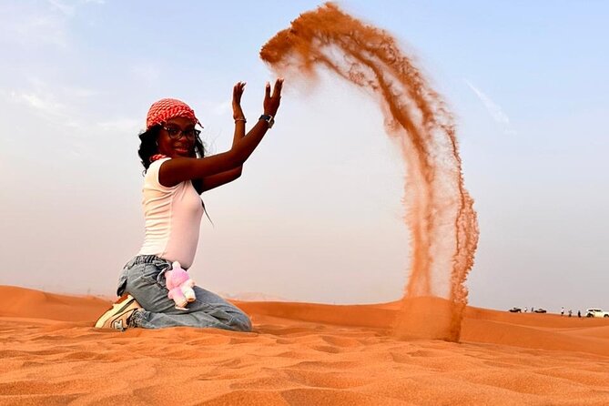 Desert Safari Adventure Dubai - Sand boarding and camel riding offer two slower views