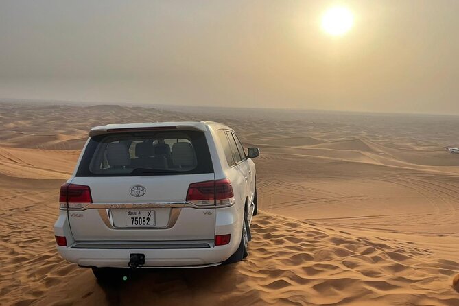 Desert safari adventure with BBQ dinner - Camel ride and sandboarding in 45 minutes