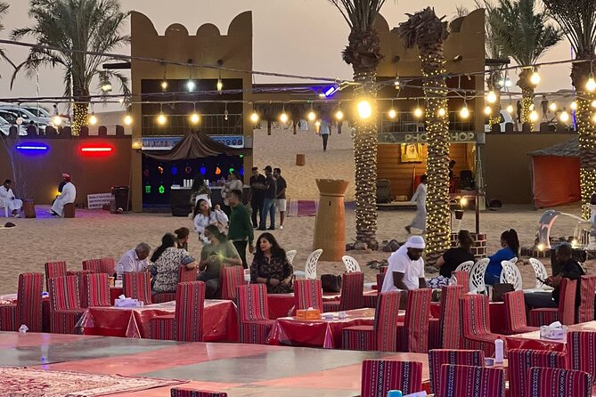 Desert Safari and Sandboarding with Dinner in Dubai - Tanoura dancing, fire, and belly-dance performances