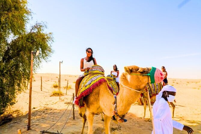 Desert Safari Dubai 30 Mins Quad Bike, Sand Board, Camel Ride BBQ - Fire, Tanoura, belly dance, and Sufi performances