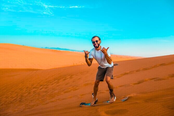 Desert Safari Dubai 30 Mins Quad Bike, Sand Board, Camel Ride BBQ - Sunset photos in an open desert
