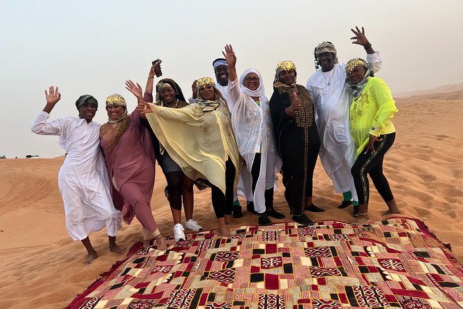 Desert Safari Dubai & Quad Bike with Dinner - Dune driving, camel riding, and sandboarding