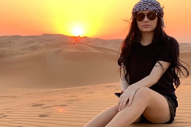 Desert Safari Dubai Tour with Dune Bashing, Camel Ride, & BBQ - Quad biking over Lahbab’s tall dunes