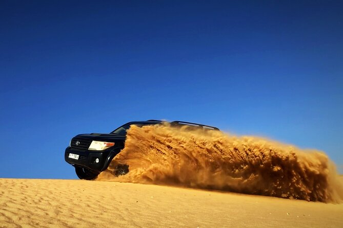 Desert Safari Dubai with BBQ - dinner, Sandboarding - Red dunes and a 20 to 30-minute dune bash