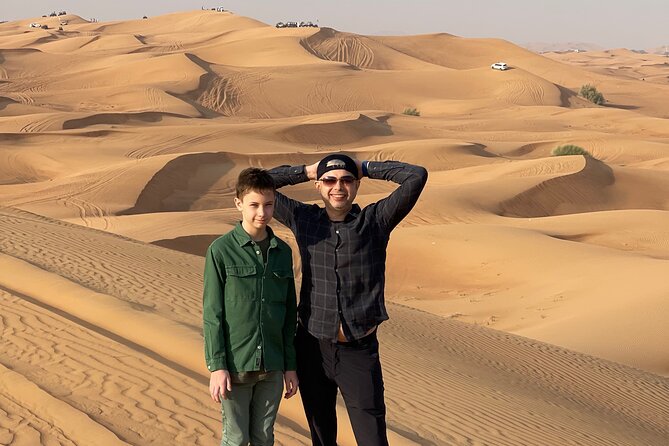 Desert Safari Dubai with BBQ - dinner, Sandboarding - Camel riding and sandboarding add variety
