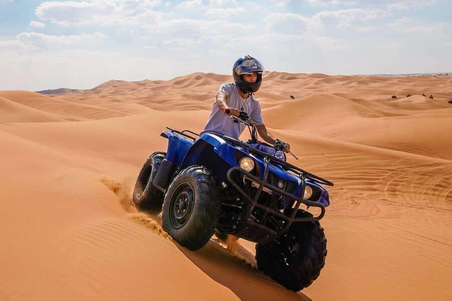 Desert Safari Dubai with Camel Ride, Sandboarding & Dinner - Dune bashing across the desert