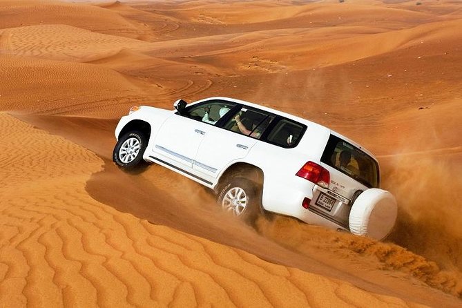 Desert Safari Dubai With Quad Bike ,camel Ride, bbq Dinner, Live Show's - Dune bashing across Dubai’s red dunes