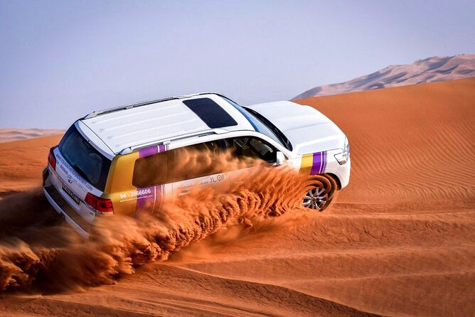 Desert Safari Evening Tours:- Special Rides, BBQ Buffet ,Live Entertainment - Sunset photos and sandboarding on the dunes