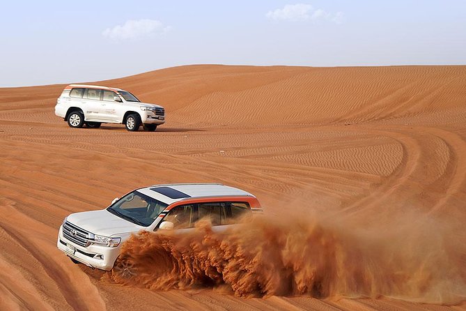 Desert Safari in 4X4 through Lahbab Desert with BBQ Dinner - Dune Bashing Through Lahbab