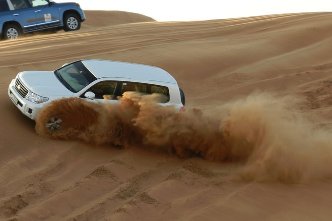 Desert safari in Dubai Red Dunes with BBQ VEG Dinner & Quad Bike - Lahbab and the red dunes