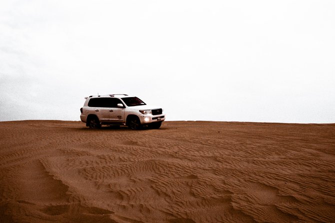 Desert Safari in Dubai with full package - no hidden cost - Sunset photographs before the camp