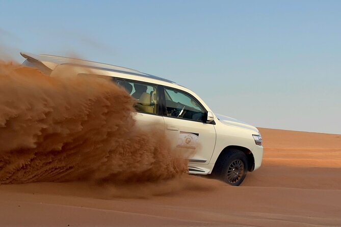 Desert Safari Quad Bike Activity with Dinner in Dubai - Henna, shisha, and Arabic dress photographs
